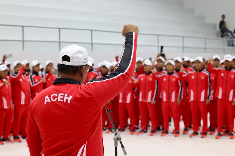 Pj Gubernur Aceh Safrizal Memberi Sambutan Sekaligus Melepas Kontingen Aceh Mengikuti PON XXI/2024 Aceh-Sumut, di GOR Koni Aceh , Rabu 28 Agustus 2024. Foto for sagoetv.com