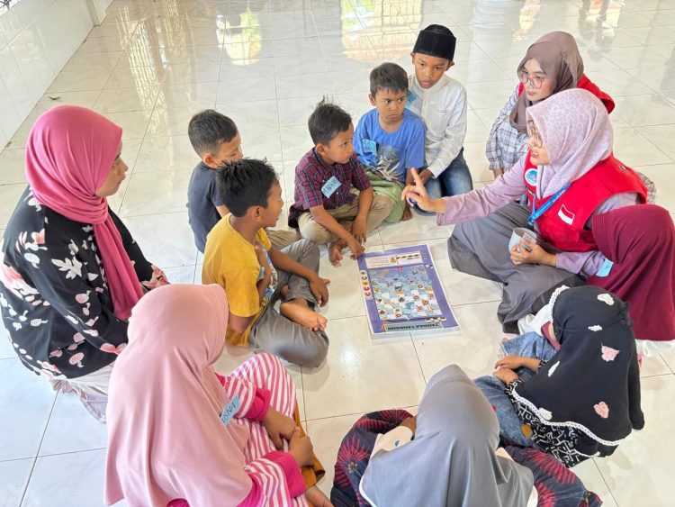 Dosen FISIP USK Ajarkan Mitigasi Bencana melalui Permainan Tangga Tangguh