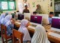 Siswa MIN 29 Aceh Besar Belajar Literasi Sains Lewat E-Book Interaktif